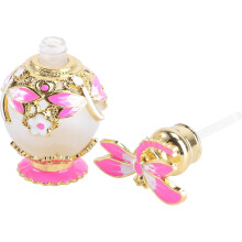 Flacon de parfum décoratif de 15 ml en forme de libellule, fabriqué en matière synthétique.