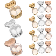 Set van 15 hartvormige siliconen oorbelachterkantjes in goud, zilver en roségoud.
