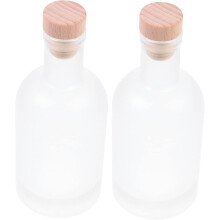 Lot de 2 bouteilles de cidre vides, rechargeables et givrées, pour la préparation de boissons maison.