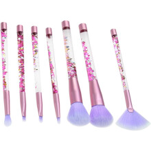 Lot de 7 pinceaux de maquillage pour femme : pinceau éventail, pinceau pour fond de teint et pinceau pour poudre.