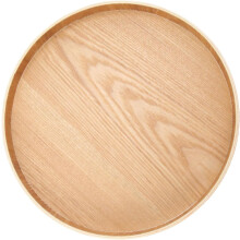 Elegante ronde houten dienblad in kaki kleur voor het serveren van hapjes en snacks in de eetkamer
