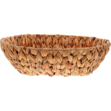 Handgemaakte broodmand, ronde snackmand voor op tafel, gemaakt van gedroogd gras, eenvoudig ontwerp.