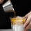 Misurino da caffè in acciaio inox con beccuccio e manico 1