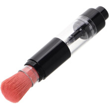 Brocha de maquillaje tipo prensa para rubor facial y polvos de doble función.