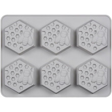 Siliconen bijenraatvorm met 6 holtes voor het maken van zeep en het bakken van honingraatcakes.