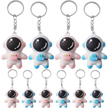 10-teiliges Set mit Cartoon-Astronauten-Schlüsselanhängern, blauen und pinken Rucksackanhängern und dekorativen Taschenornamenten