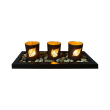 Ensemble de bougeoirs en bois, verre et galets