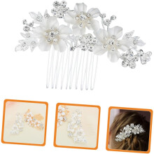Haarkam met strassbloemmotief voor bruiloften en feesten. Elegant bruidsaccessoire met chique bloemendesign.