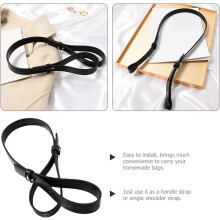Justerbar crossbody-veske med skinnrem og spenne