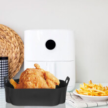 Tapis de cuisson réutilisable en silicone antiadhésif pour friteuse à air et four, pliable, noir.
