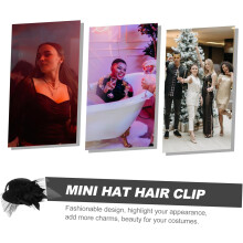 Elegante mini cappellino nero con decorazioni floreali e fermaglio per capelli. Un accessorio in stile punk perfetto per feste ed eventi.