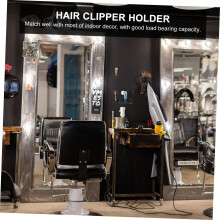 Aufbewahrungsmöglichkeit für Haarschneidemaschine und Wandhalterung für Kamm