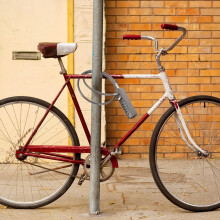 Candado de cable portátil de combinación de 4 dígitos para equipaje y bicicletas con carcasa de aleación de zinc a prueba de manipulaciones.