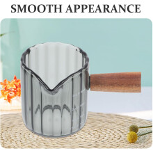 Jarra de leche de vidrio de 90 ml con mango de madera y taza medidora.