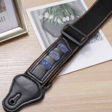 Correa práctica de algodón negro para ukelele y guitarra con función antiestiramiento.