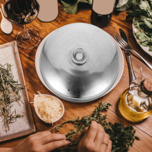 Coperchio per vaporiera in acciaio inox con comoda maniglia, colore argento.