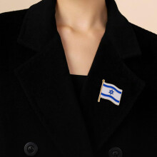 Set van 3 broches met de Israëlische vlag als decoratie voor feestjes en als accessoire bij pakken.