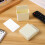 Set di 4 supporti adesivi da parete per telecomandi, colore beige, organizer per telefono e controller. 8