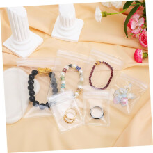 Lot de 150 pochettes à bijoux auto-scellantes pour protéger vos bijoux du ternissement lors de vos déplacements professionnels.