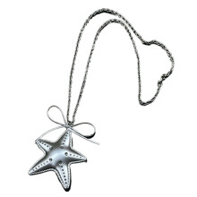 Collier avec pendentif nœud papillon et étoile en argent, Style
