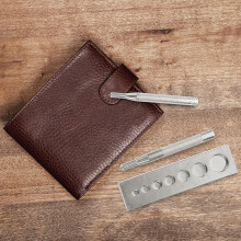 Kit de 11 outils pour boutons-pression et rivets, idéal pour la couture et les loisirs créatifs.