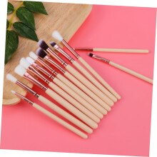 Ensemble de 24 pinceaux de maquillage professionnels pour l'application du fond de teint et des fards à paupières.