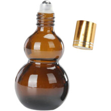 Lot de 5 flacons roll-on en verre pour huiles essentielles, idéaux pour les voyages et l'aromathérapie.