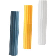 Set da viaggio composto da 3 pezzi: porta spazzolino da denti e contenitore per dentifricio, colori bianco, giallo e blu.