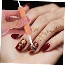 Nagelkunstkwastenset met verwisselbare kopjes en dubbelzijdig houten handvat.