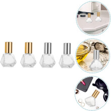 Lot de 4 flacons roll-on en verre rechargeables pour huiles essentielles, idéaux pour les voyages, les soins de la peau et le parfum.