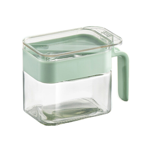 Recipiente de vidro transparente para temperos com alça e tampa em formato de colher.