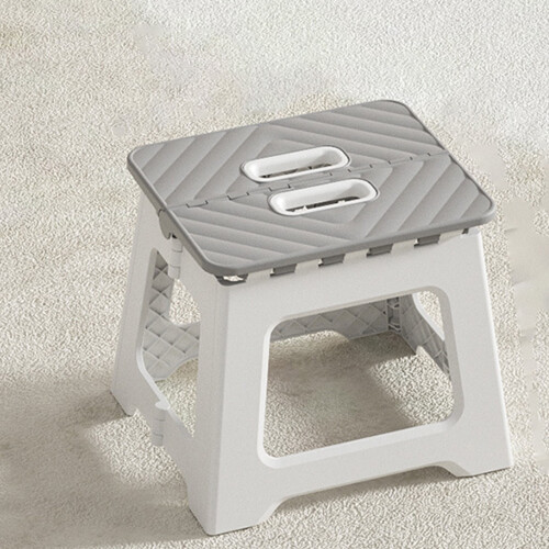 Tabouret pliant – Patchwork gris et blanc, compact et stable 1