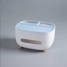 Witte tissuebox met houten poten en telefoonhouder voor op het bureau