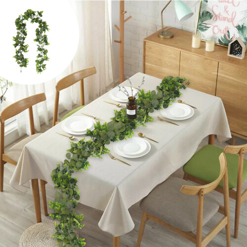 Couronne de vigne d'automne avec citrouilles et feuilles