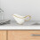 Saucière en porcelaine blanche à bordure dorée 4