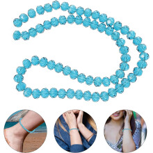 bandes de 210 perles de verre cristal bleu avec trous pour enfilage, idéales pour la création de bijoux DIY.