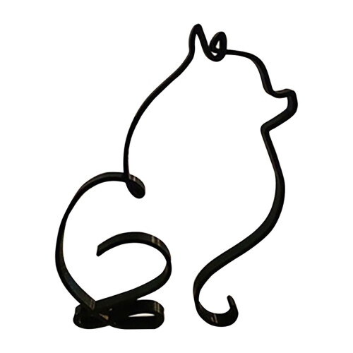 Minimalistická kovová socha psa na stůl