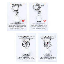 Packung mit 4 entzückenden Pinguin-Schlüsselanhängern mit