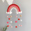 Rainbow wall hanging decor with pastel pom poms 2