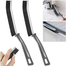 Kierenreinigingsborstel met nylon borstelharen en ergonomische handgreep voor het reinigen van raam- en deurrails in huis.