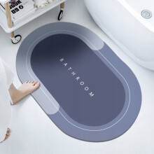 Alfombrilla de baño con superficie textil de secado rápido y base de silicona antideslizante para ducha y aseo.