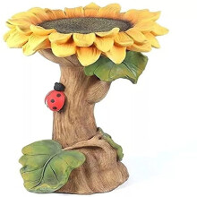 Baño para pájaros con forma de girasol y mariquita, pedestal marrón.