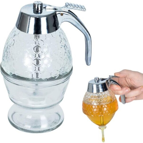 Dispenser in vetro per miele e sciroppo con versamento preciso, include barattolo e vassoio, altezza 15,5 cm.