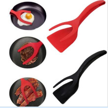 2-in-1 silicone egg spatula with tongs, red and black