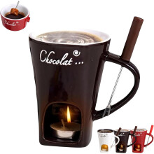 Tasse à fondue en céramique avec fourchette et bougie
