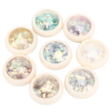 Schitterende pailletten voor nail art met een kameleoneffect, holografische glittervlokjes in een handzaam ontwerp.