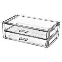 Transparante acryl opbergdoos voor cosmetica met uitneembare lades voor make-up en sieraden op bureau of aanrecht