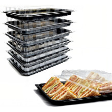 Paquete de 6 bandejas reutilizables para servir alimentos de 34 x 25 cm con tapa.