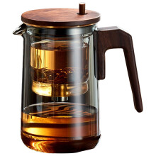 Glass teapot with wooden handle and one-button filter