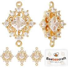 1 Caixa com 8 Conectores de Latão Banhado a Ouro 18K com Zircônias Cúbicas em Formato de Losango e Flor Vazada